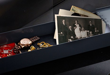 Custodian Vaults safety deposit box displaying photos, heirlooms, war medals