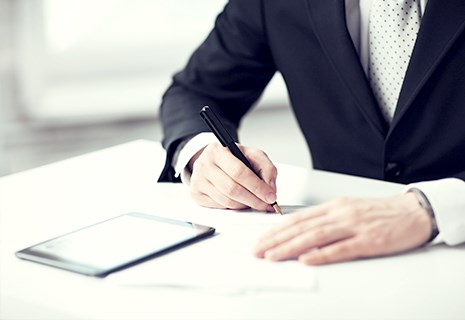 Custodian Vaults insurance documents being signed